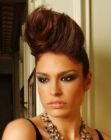 Updo with backcombed hair and a high quiff