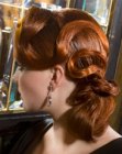 Tick hair in an updo with a serpentine form