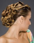 Ancient Greece inspired up-style with knots at the nape of the neck