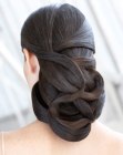 Smooth hairstyle with wrapped strands