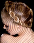 Updo with a twisted ponytail slung around the head