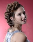 Romantic up style with curls and side-strands
