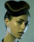 Tight updo with slicked-back hair