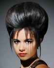 Updo with bulbous volume for a mermaid look