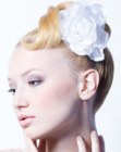 Wedding hairdo with a gardenia flower