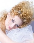 Bridal hairstyle with curls and long twirls