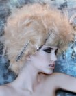 Platinum blonde updo with back-combed hair