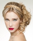 Princess look updo with the hair twirled into a froth of curls