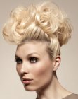 Blonde updo with giant curls
