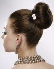 Hairstyle with a smooth chignon