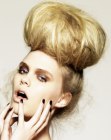 Elaborate updo with a huge ball of hair