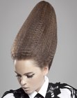 Hair styled up into a cone
