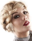 Fashionable blonde updo with a braid