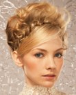 Blonde up-style with a braided hairband