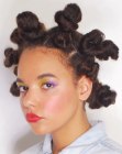 African hair in an updo with tight knots