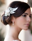 Wedding hairstyle with a hair flower