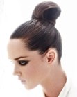 Strict updo with a high knot