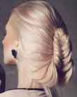 Hairstyle with a pinned herringbone braid