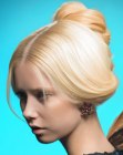 Blonde hair with a braided chignon