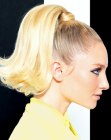 Blonde hair with a bouncy high ponytail
