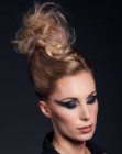 Updo with a high French roll
