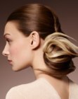 Preppy up-style with a reverse banana chignon