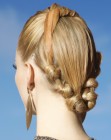 Updo with twisted hair and sleek areas