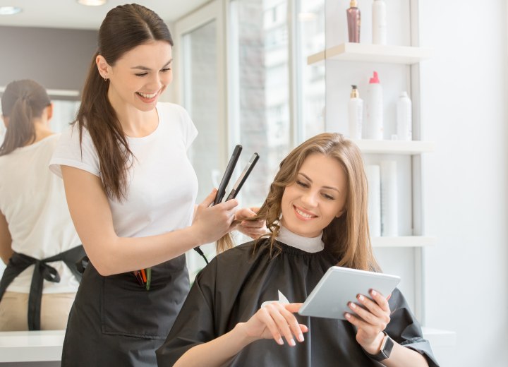 Hairdresser and client discussing hair options