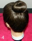 Twist and warp the ponytail intio a bun