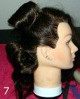 Vintage up-style - Roll the middle section of the hair