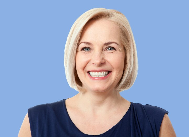 Woman with short hair after cutting her long hair