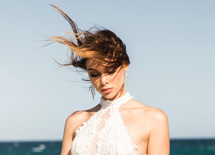 Bride on a windy beach