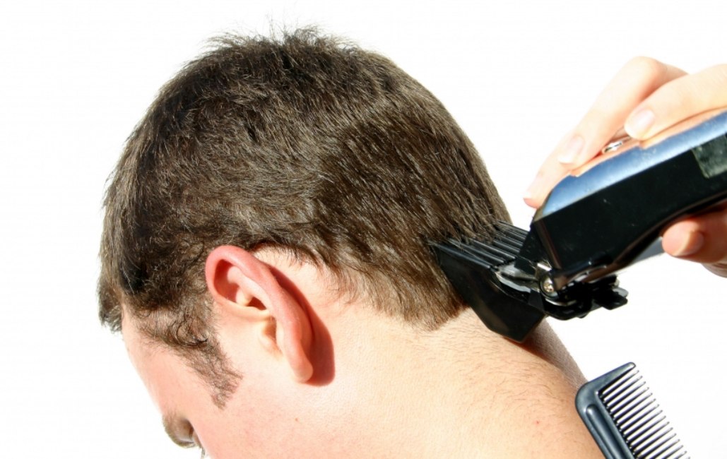 using clippers to trim hair