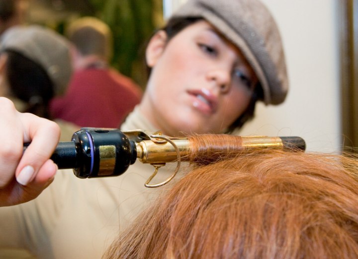 Curling hair with a curling iron