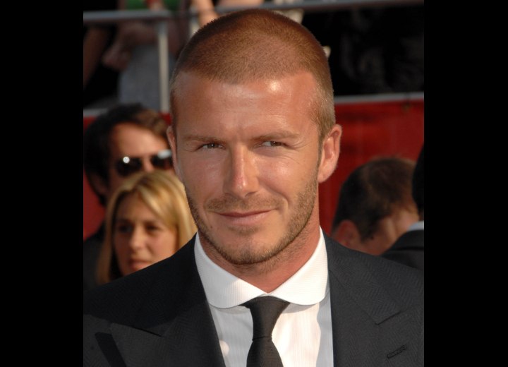 David Beckham with a short stubbly beard