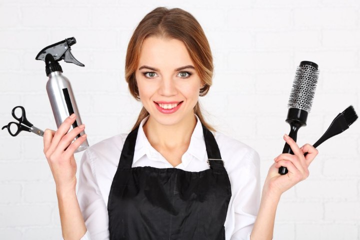 Hair stylist with different hair styling tools