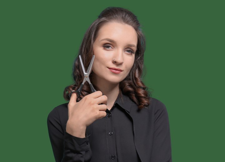 Hairdresser holding scissors