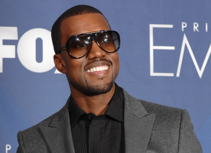 Kanye West with a debonair moustache