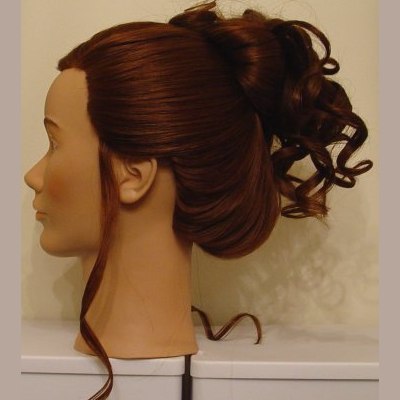 Chignon con coda di ricci