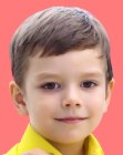 Neat haircut with a dynamic fringe for little boys