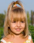 Fountain hairstyle with a tiny ponytail for little girls