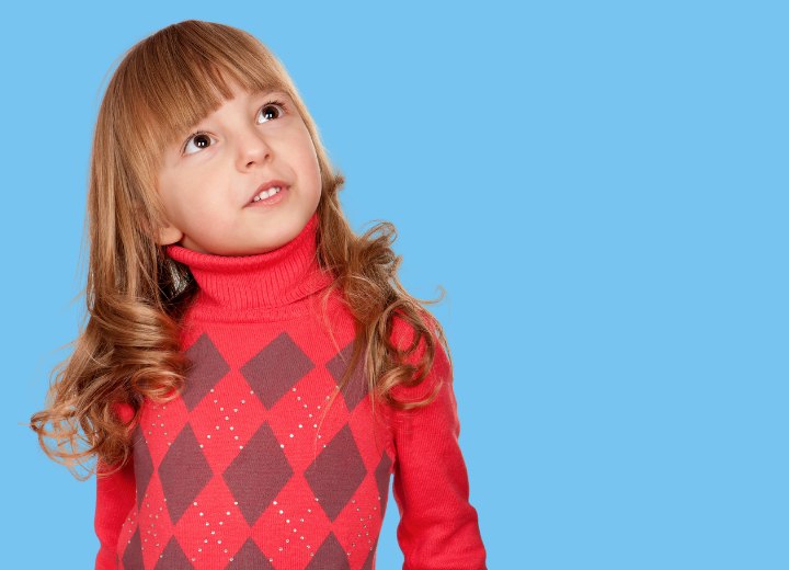 Little girl with long hair and curls