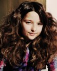 Long hairstyle for young girls with naturally curly hair