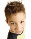 Short spiky hairstyle with razor cutting for little boys