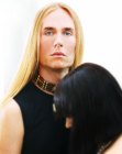 Man with very long blond hair