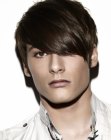 Fashionable hair with long diagonal bangs for men