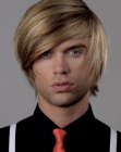 Multi-tonal blonde shag hairstyle for men