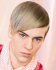 Trendy sleek men's hair with drop shaped bangs