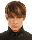 Men's hairstyle with Beatles inspiration and long bangs
