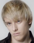Young blonde man with cool hair